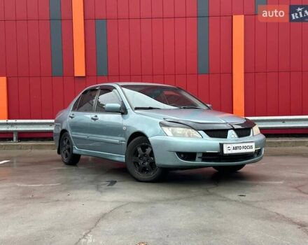 Зелений Міцубісі Lancer, об'ємом двигуна 1.58 л та пробігом 208 тис. км за 3990 $, фото 1 на Automoto.ua