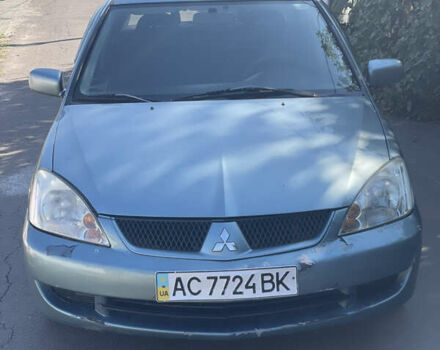 Зелений Міцубісі Lancer, об'ємом двигуна 1.58 л та пробігом 151 тис. км за 2850 $, фото 1 на Automoto.ua