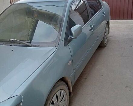 Зеленый Мицубиси Лансер, объемом двигателя 1.6 л и пробегом 225 тыс. км за 4716 $, фото 1 на Automoto.ua