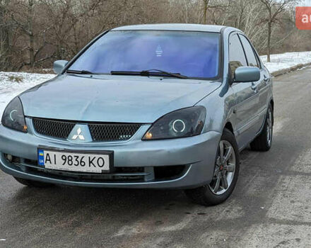 Зелений Міцубісі Lancer, об'ємом двигуна 1.6 л та пробігом 320 тис. км за 4500 $, фото 1 на Automoto.ua