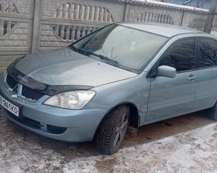 Зелений Міцубісі Lancer, об'ємом двигуна 1.6 л та пробігом 320 тис. км за 4500 $, фото 1 на Automoto.ua