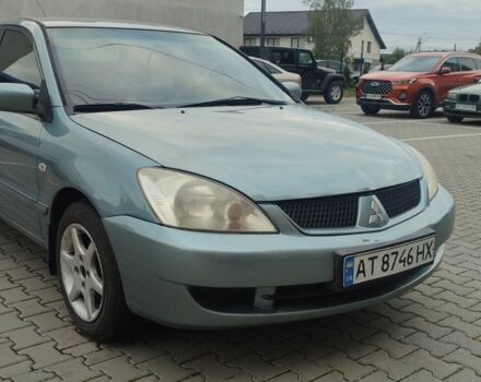 Зелений Міцубісі Lancer, об'ємом двигуна 1.6 л та пробігом 247 тис. км за 2999 $, фото 1 на Automoto.ua