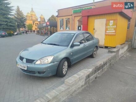 Мицубиси Лансер 2006 в Луцке на Automoto.ua Зеленый Мицубиси Лансер, объемом двигателя 1.6 л и пробегом 150 тыс. км за 2400 $, фото 1 на Automoto.ua