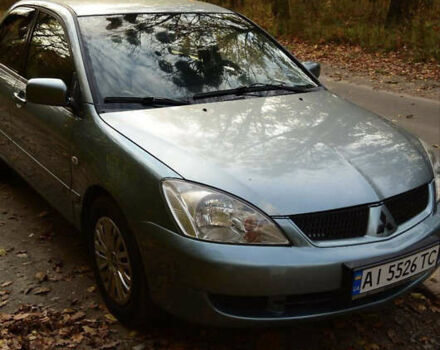 Зеленый Мицубиси Лансер, объемом двигателя 1.58 л и пробегом 259 тыс. км за 4300 $, фото 1 на Automoto.ua