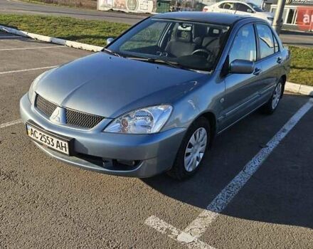 Зелений Міцубісі Lancer, об'ємом двигуна 1.58 л та пробігом 215 тис. км за 5000 $, фото 1 на Automoto.ua