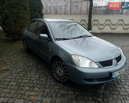 Зелений Міцубісі Lancer, об'ємом двигуна 1.58 л та пробігом 313 тис. км за 4150 $, фото 1 на Automoto.ua