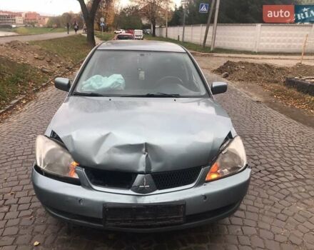 Зеленый Мицубиси Лансер, объемом двигателя 1.6 л и пробегом 184 тыс. км за 2000 $, фото 1 на Automoto.ua