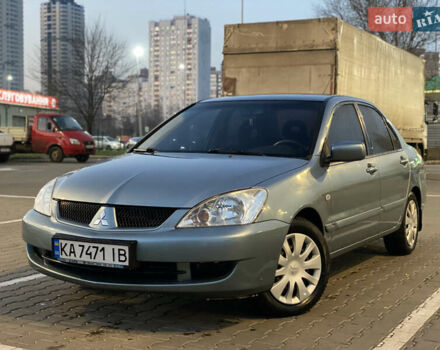 Зелений Міцубісі Lancer, об'ємом двигуна 1.58 л та пробігом 276 тис. км за 3400 $, фото 1 на Automoto.ua