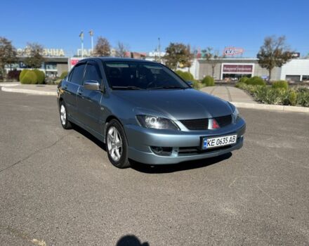 Зелений Міцубісі Lancer, об'ємом двигуна 2 л та пробігом 205 тис. км за 5499 $, фото 1 на Automoto.ua