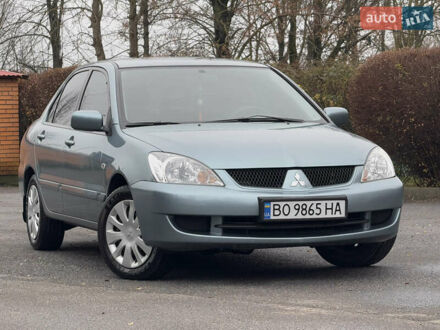 Зеленый Мицубиси Лансер, объемом двигателя 1.6 л и пробегом 214 тыс. км за 4150 $, фото 1 на Automoto.ua