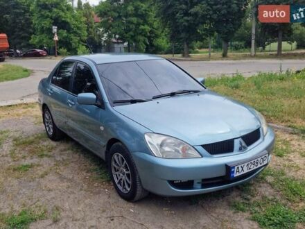 Мицубиси Лансер 2007 в Чугуеве на Automoto.ua Зеленый Мицубиси Лансер, объемом двигателя 1.58 л и пробегом 206 тыс. км за 4000 $, фото 1 на Automoto.ua