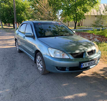 Зелений Міцубісі Lancer, об'ємом двигуна 1.6 л та пробігом 220 тис. км за 3700 $, фото 1 на Automoto.ua