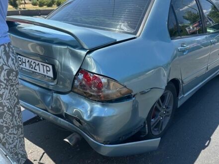 Зелений Міцубісі Lancer, об'ємом двигуна 2 л та пробігом 200 тис. км за 2300 $, фото 1 на Automoto.ua