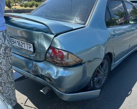 Зелений Міцубісі Lancer, об'ємом двигуна 2 л та пробігом 200 тис. км за 2300 $, фото 1 на Automoto.ua