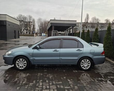 Зелений Міцубісі Lancer, об'ємом двигуна 1.6 л та пробігом 165 тис. км за 5500 $, фото 1 на Automoto.ua
