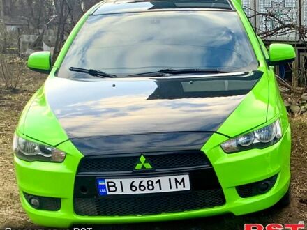 Зелений Міцубісі Lancer, об'ємом двигуна 2 л та пробігом 227 тис. км за 7200 $, фото 1 на Automoto.ua