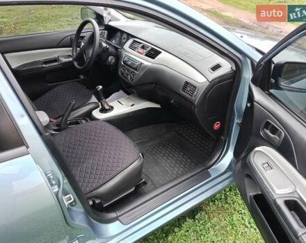 Зеленый Мицубиси Лансер, объемом двигателя 1.58 л и пробегом 310 тыс. км за 3300 $, фото 1 на Automoto.ua