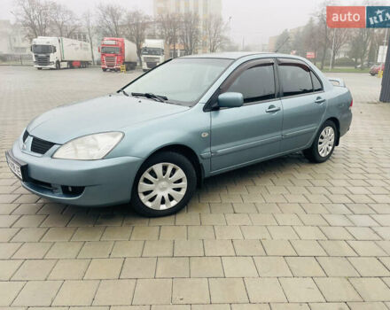 Зеленый Мицубиси Лансер, объемом двигателя 1.6 л и пробегом 164 тыс. км за 5000 $, фото 1 на Automoto.ua