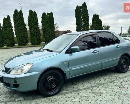 Зелений Міцубісі Lancer, об'ємом двигуна 1.58 л та пробігом 207 тис. км за 3400 $, фото 1 на Automoto.ua
