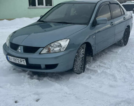 Зеленый Мицубиси Лансер, объемом двигателя 1.6 л и пробегом 257 тыс. км за 4950 $, фото 1 на Automoto.ua