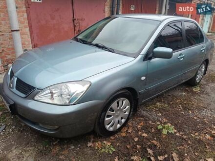 Зелений Міцубісі Lancer, об'ємом двигуна 1.6 л та пробігом 219 тис. км за 4700 $, фото 1 на Automoto.ua