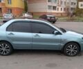 Зелений Міцубісі Lancer, об'ємом двигуна 1.6 л та пробігом 106 тис. км за 6400 $, фото 1 на Automoto.ua