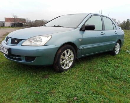 Зелений Міцубісі Lancer, об'ємом двигуна 1.6 л та пробігом 319 тис. км за 3300 $, фото 1 на Automoto.ua