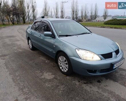 Зелений Міцубісі Lancer, об'ємом двигуна 1.6 л та пробігом 162 тис. км за 4700 $, фото 1 на Automoto.ua