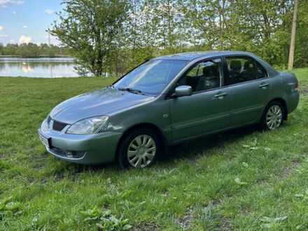 Зелений Міцубісі Lancer, об'ємом двигуна 1.6 л та пробігом 275 тис. км за 4200 $, фото 1 на Automoto.ua