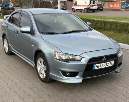 Зеленый Мицубиси Лансер, объемом двигателя 2 л и пробегом 177 тыс. км за 7200 $, фото 1 на Automoto.ua