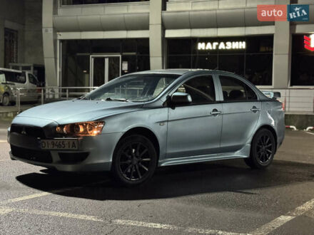 Зеленый Мицубиси Лансер, объемом двигателя 1.5 л и пробегом 260 тыс. км за 3750 $, фото 1 на Automoto.ua