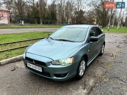 Зелений Міцубісі Lancer, об'ємом двигуна 2 л та пробігом 135 тис. км за 5700 $, фото 1 на Automoto.ua