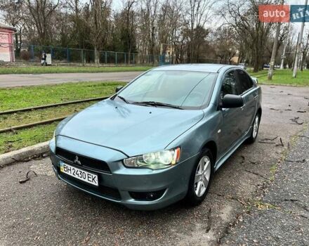 Зелений Міцубісі Lancer, об'ємом двигуна 2 л та пробігом 135 тис. км за 5700 $, фото 1 на Automoto.ua