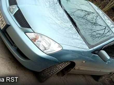 Зеленый Мицубиси Лансер, объемом двигателя 1.6 л и пробегом 176 тыс. км за 4800 $, фото 1 на Automoto.ua