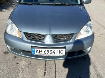 Зеленый Мицубиси Лансер, объемом двигателя 1.58 л и пробегом 180 тыс. км за 4800 $, фото 1 на Automoto.ua