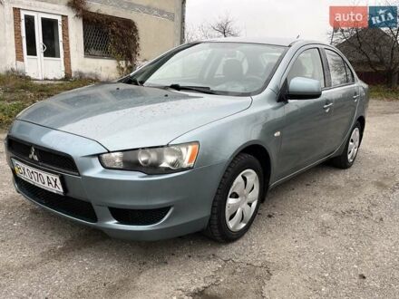 Зеленый Мицубиси Лансер, объемом двигателя 1.5 л и пробегом 170 тыс. км за 6999 $, фото 1 на Automoto.ua