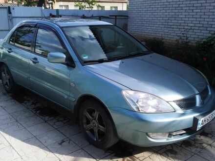 Мицубиси Лансер 2008 в Славянске на Automoto.ua Зеленый Мицубиси Лансер, объемом двигателя 1.6 л и пробегом 150 тыс. км за 5200 $, фото 1 на Automoto.ua