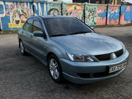 Зелений Міцубісі Lancer, об'ємом двигуна 1.6 л та пробігом 164 тис. км за 6000 $, фото 1 на Automoto.ua