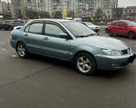 Зеленый Мицубиси Лансер, объемом двигателя 1.6 л и пробегом 234 тыс. км за 5300 $, фото 1 на Automoto.ua