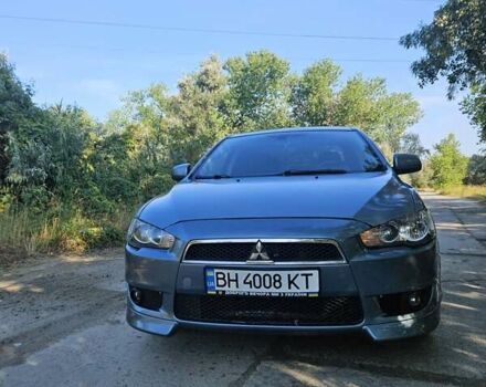 Зеленый Мицубиси Лансер, объемом двигателя 1.47 л и пробегом 215 тыс. км за 5000 $, фото 1 на Automoto.ua