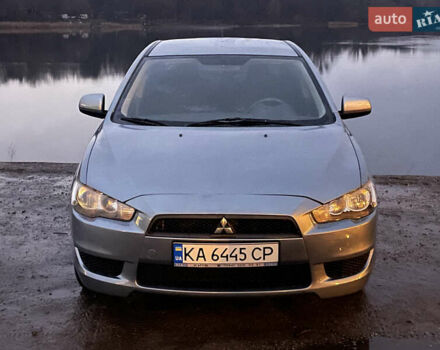 Зеленый Мицубиси Лансер, объемом двигателя 1.5 л и пробегом 168 тыс. км за 6500 $, фото 1 на Automoto.ua