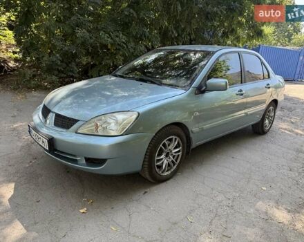 Зелений Міцубісі Lancer, об'ємом двигуна 1.6 л та пробігом 260 тис. км за 4900 $, фото 1 на Automoto.ua