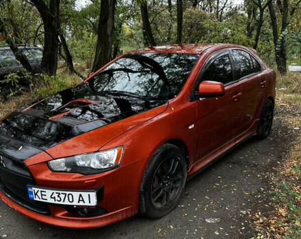 Мицубиси Лансер 2008 в Днепре (Днепропетровске) на Automoto.ua Оранжевый Мицубиси Лансер, объемом двигателя 2 л и пробегом 164 тыс. км за 9000 $, фото 2 на Automoto.ua