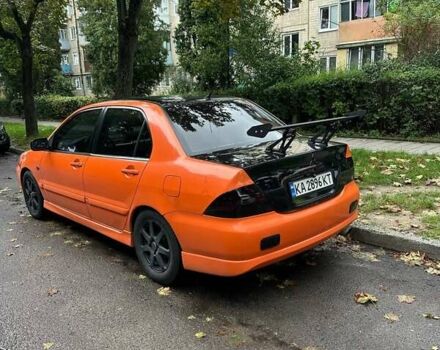Оранжевый Мицубиси Лансер, объемом двигателя 1.59 л и пробегом 325 тыс. км за 4300 $, фото 5 на Automoto.ua