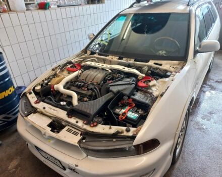 Белый Мицубиси Легнум, объемом двигателя 2.5 л и пробегом 205 тыс. км за 12104 $, фото 1 на Automoto.ua