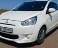 Белый Мицубиси Мираж, объемом двигателя 1 л и пробегом 106 тыс. км за 7092 $, фото 1 на Automoto.ua
