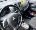 Белый Мицубиси Мираж, объемом двигателя 1.19 л и пробегом 148 тыс. км за 6550 $, фото 8 на Automoto.ua
