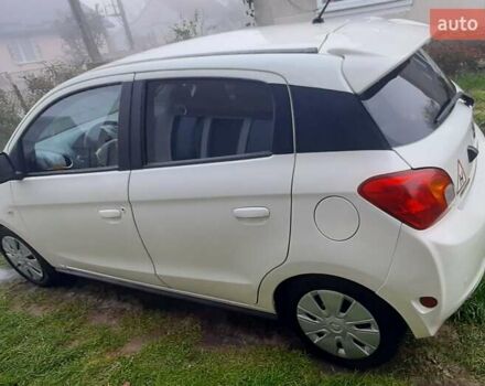 Белый Мицубиси Мираж, объемом двигателя 1.19 л и пробегом 148 тыс. км за 6550 $, фото 2 на Automoto.ua