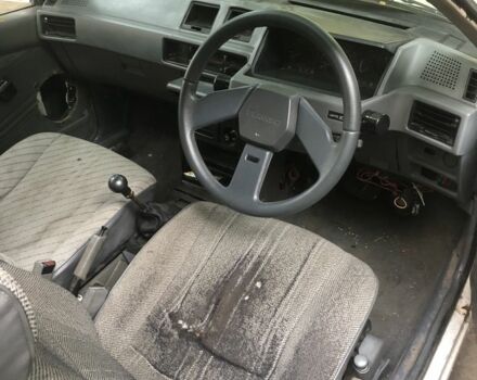 Белый Мицубиси Мираж, объемом двигателя 1.3 л и пробегом 283 тыс. км за 350 $, фото 3 на Automoto.ua