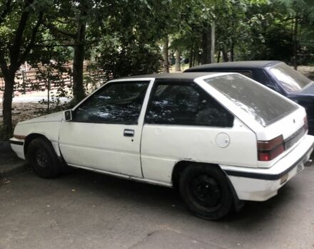 Белый Мицубиси Мираж, объемом двигателя 1.3 л и пробегом 283 тыс. км за 350 $, фото 2 на Automoto.ua